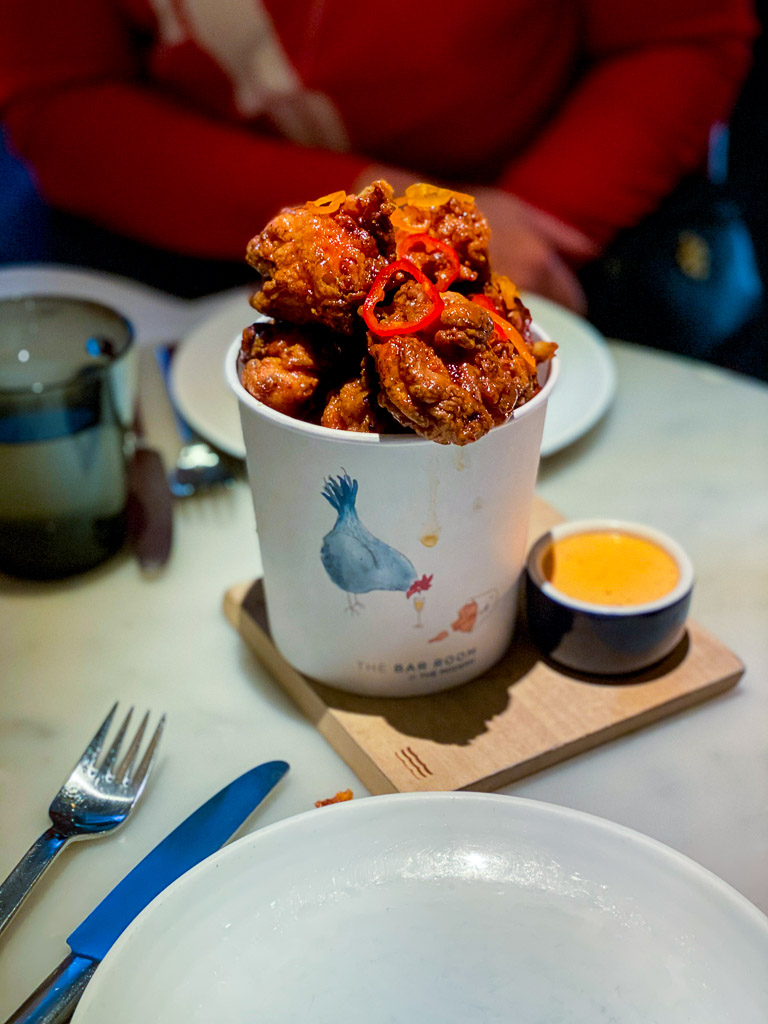 The spicy chicken nuggets at The Modern in NYC were meant to be paired with champagne.