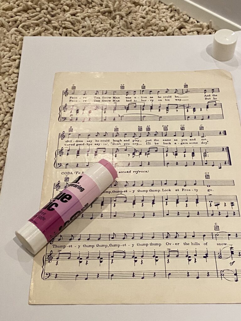 Christmas craft ideas, easy Christmas crafts, DIY Christmas decorations, handmade Christmas ornaments, vintage Christmas décor, vintage holiday crafts, sheet music crafts, easy Christmas craft using vintage sheet music, vintage sheet music Christmas decor idea, handmade holiday crafts with sheet music, Christmas paper crafts with vintage music sheets, creative ways to use vintage sheet music for Christmas, DIY vintage Christmas decorations step-by-step, repurposing old sheet music for holiday crafts, elegant Christmas crafts with old music paper